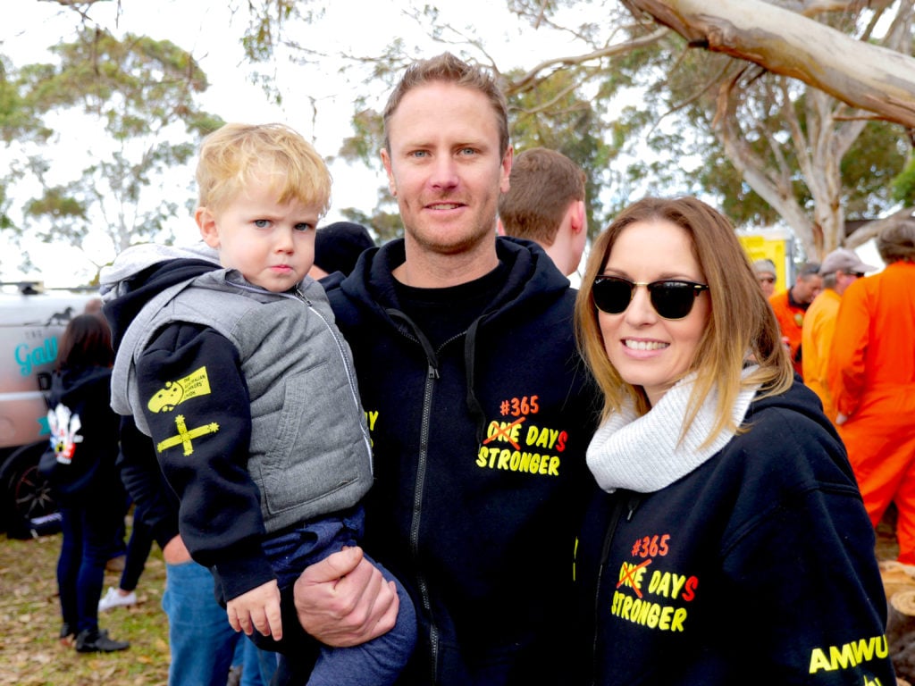 Family with toddler at the one year anniversary rally